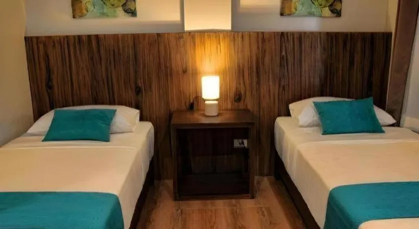 Bed in Batis Aramin Resort And Hotel Corp.