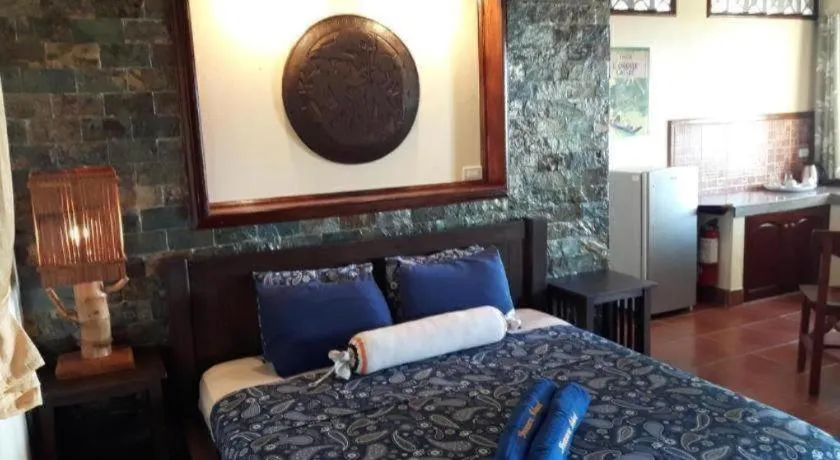 Bed in Treasure Island Beach Bungalows