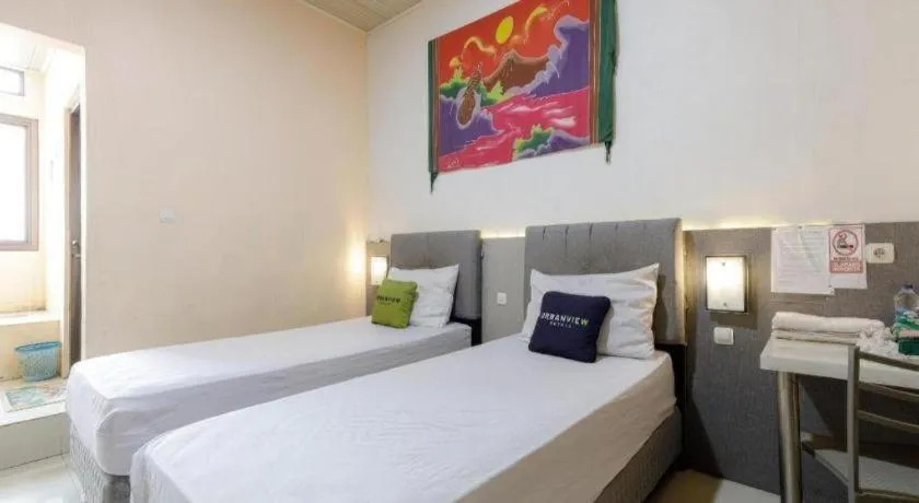 Bed in Urbanview Hotel Delima 101 Syariah