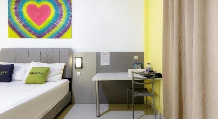 Bed in Urbanview Hotel Delima 101 Syariah