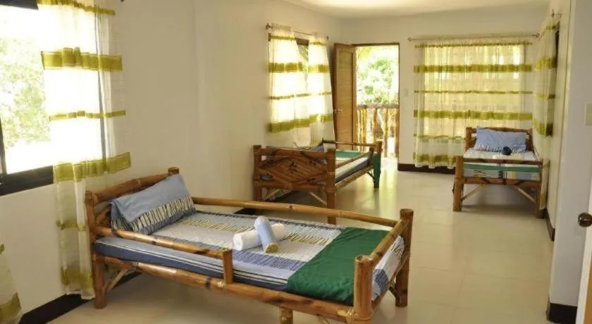 Bed in Paseo Verde Beach Resort