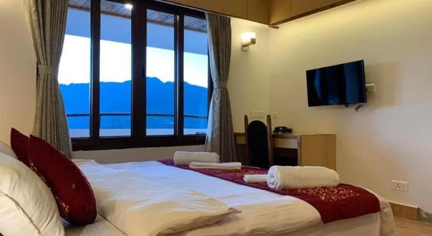 Bed in Hotel Tashi Delek