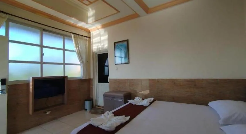 Bed in Hotel Cendrawasih