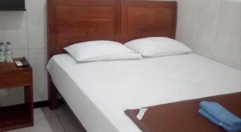 Bed in Hotel Cendrawasih