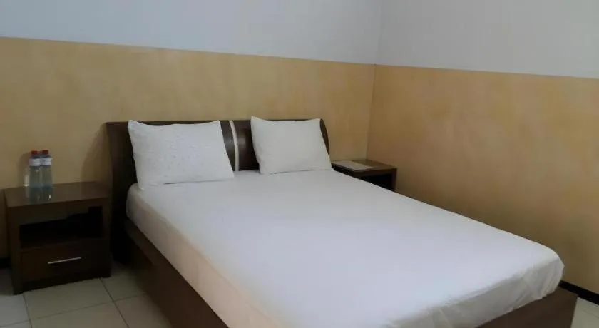 Bed in Hotel Cendrawasih