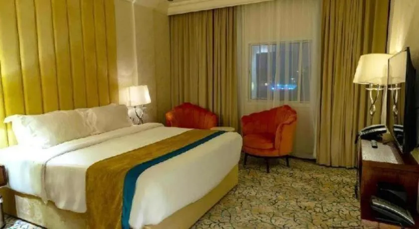Bed in Gulf Pearls Hotel
