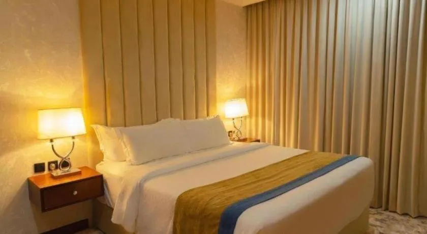 Bed in Gulf Pearls Hotel