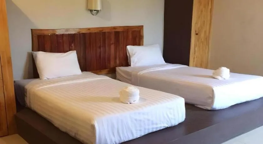 Bed in Baan Pan Din Resort