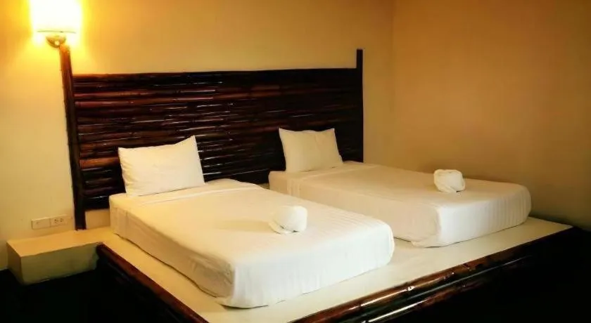 Bed in Baan Pan Din Resort