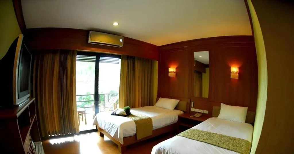 Bed in La Playa Boutique Resort