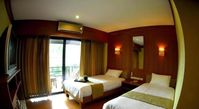 Bed in La Playa Boutique Resort