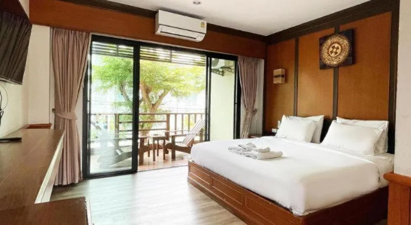 Bed in La Playa Boutique Resort