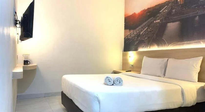 Bed in Cordex Hotel Medan