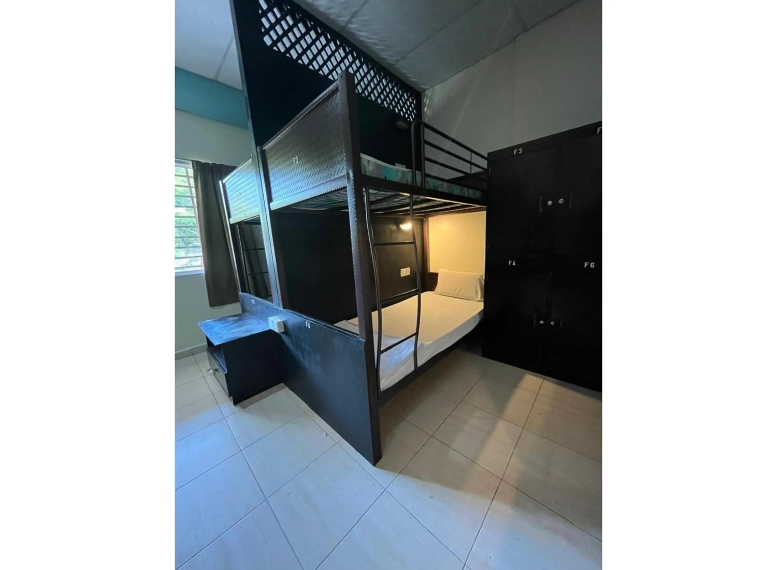 Bedroom in Collection O Batu Ferringhi Beach formerly ESQ Ferringhi