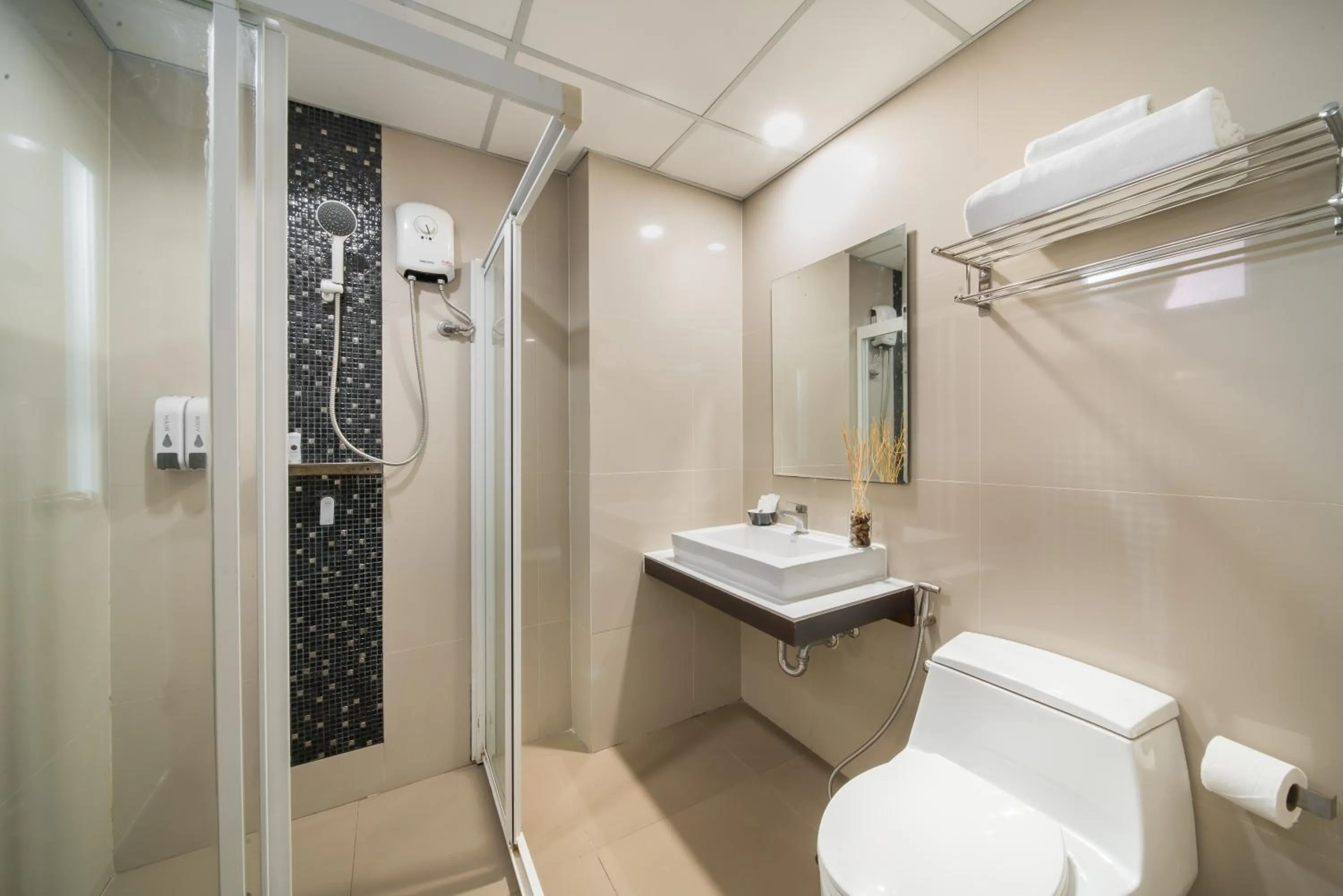 Toilet in De Botan Srinakarin Hotel & Residence