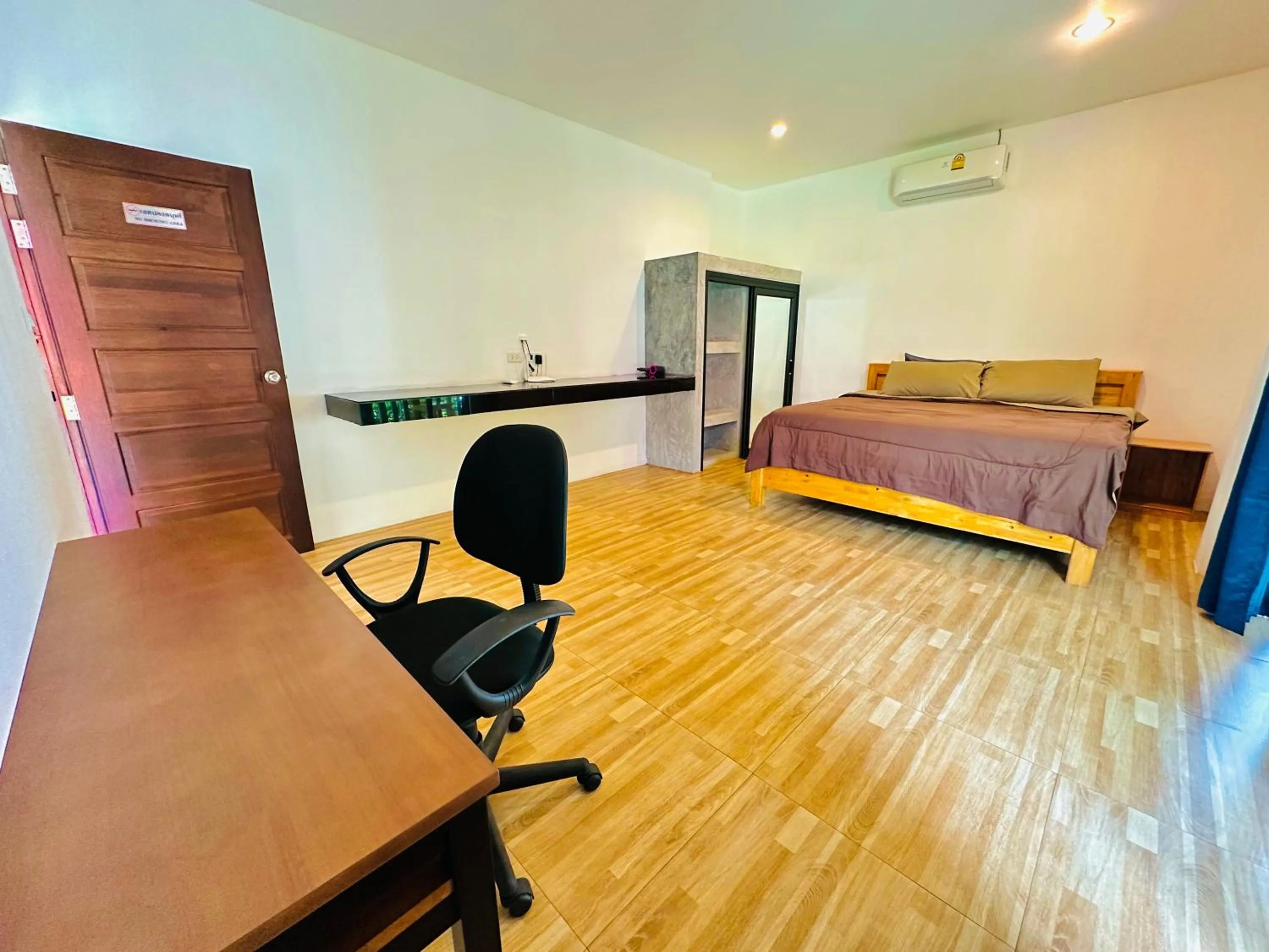 Bed in The Scenery Beach Resort