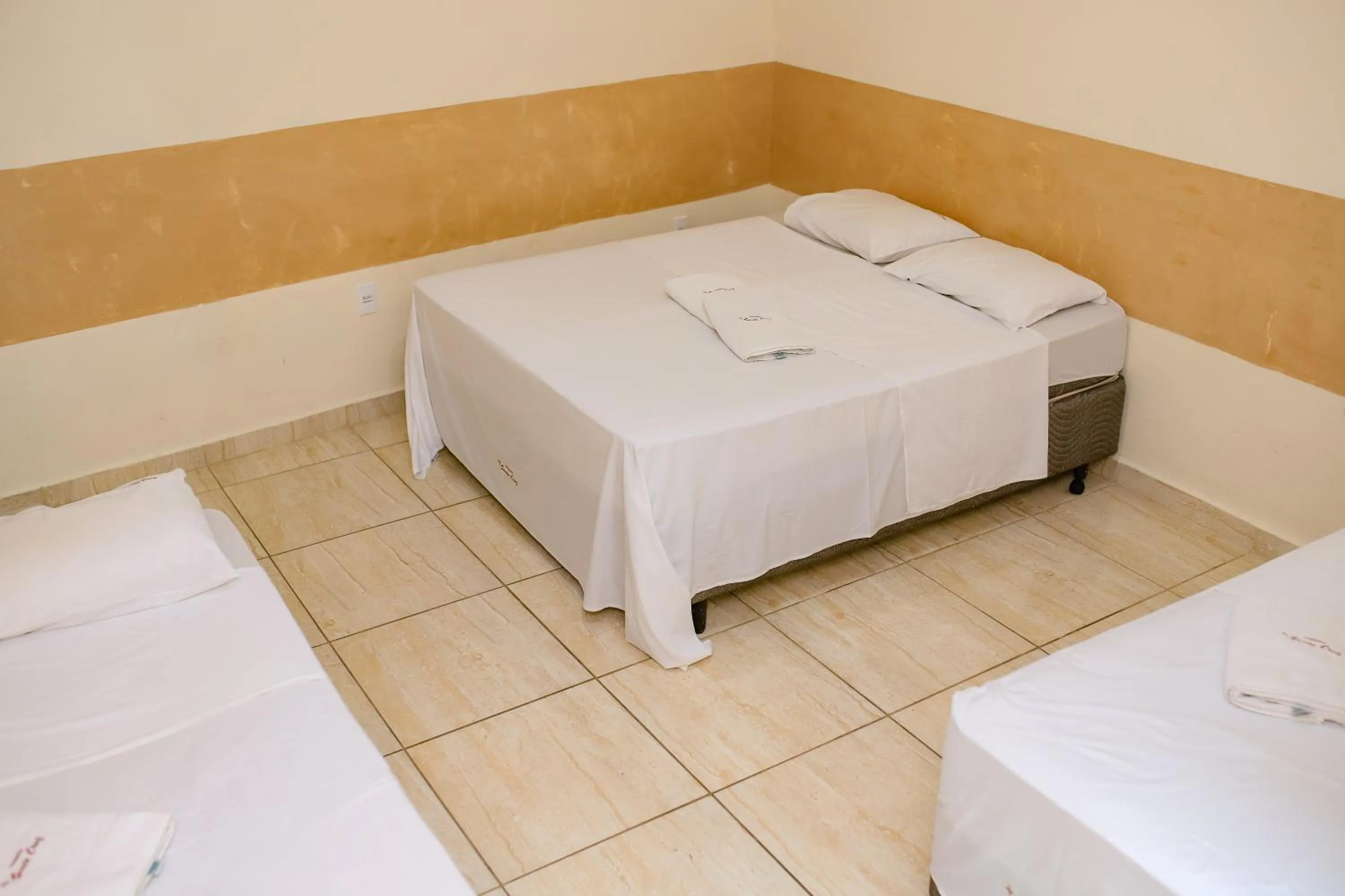 Bed in Pousada Santa Cruz