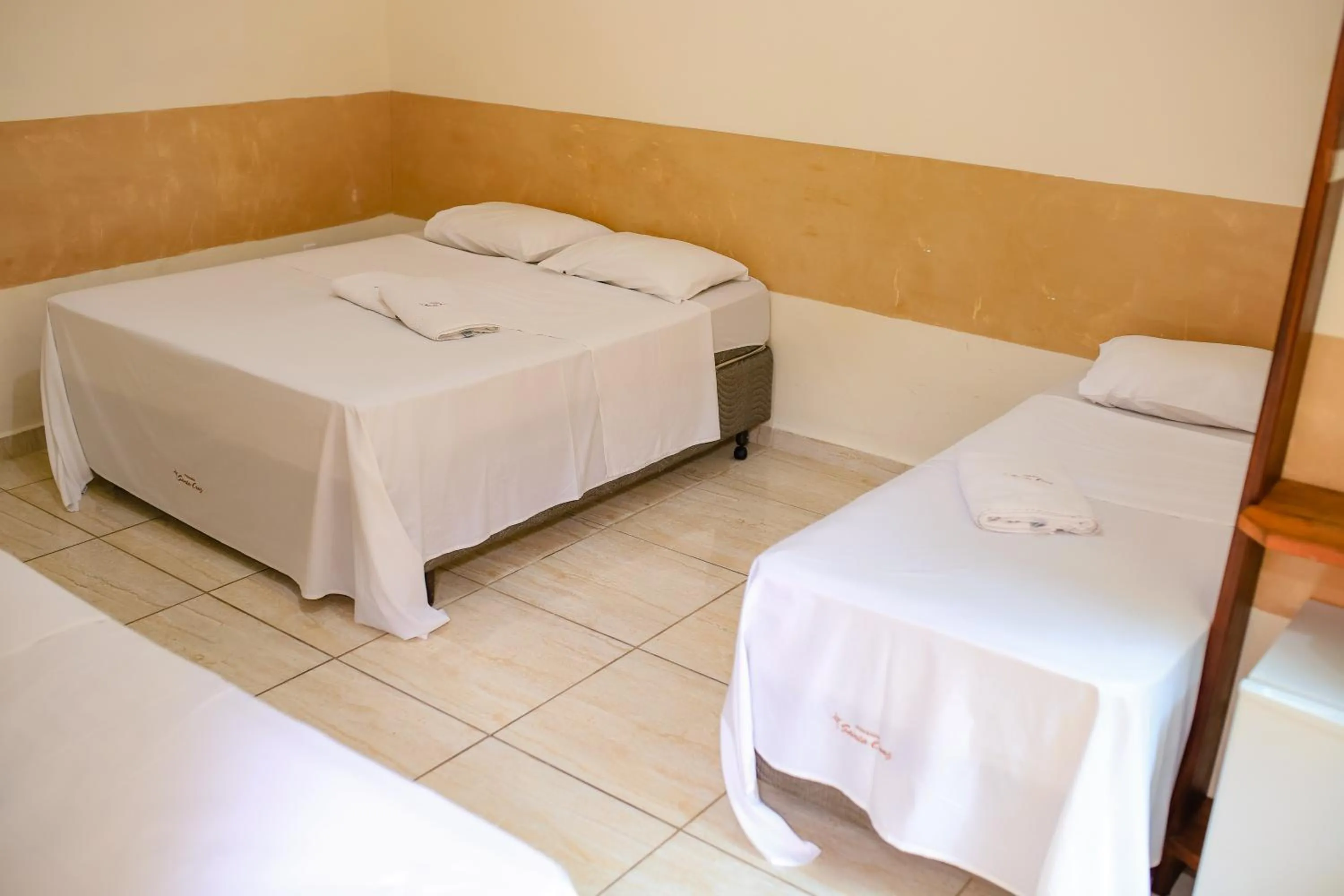 Bed in Pousada Santa Cruz