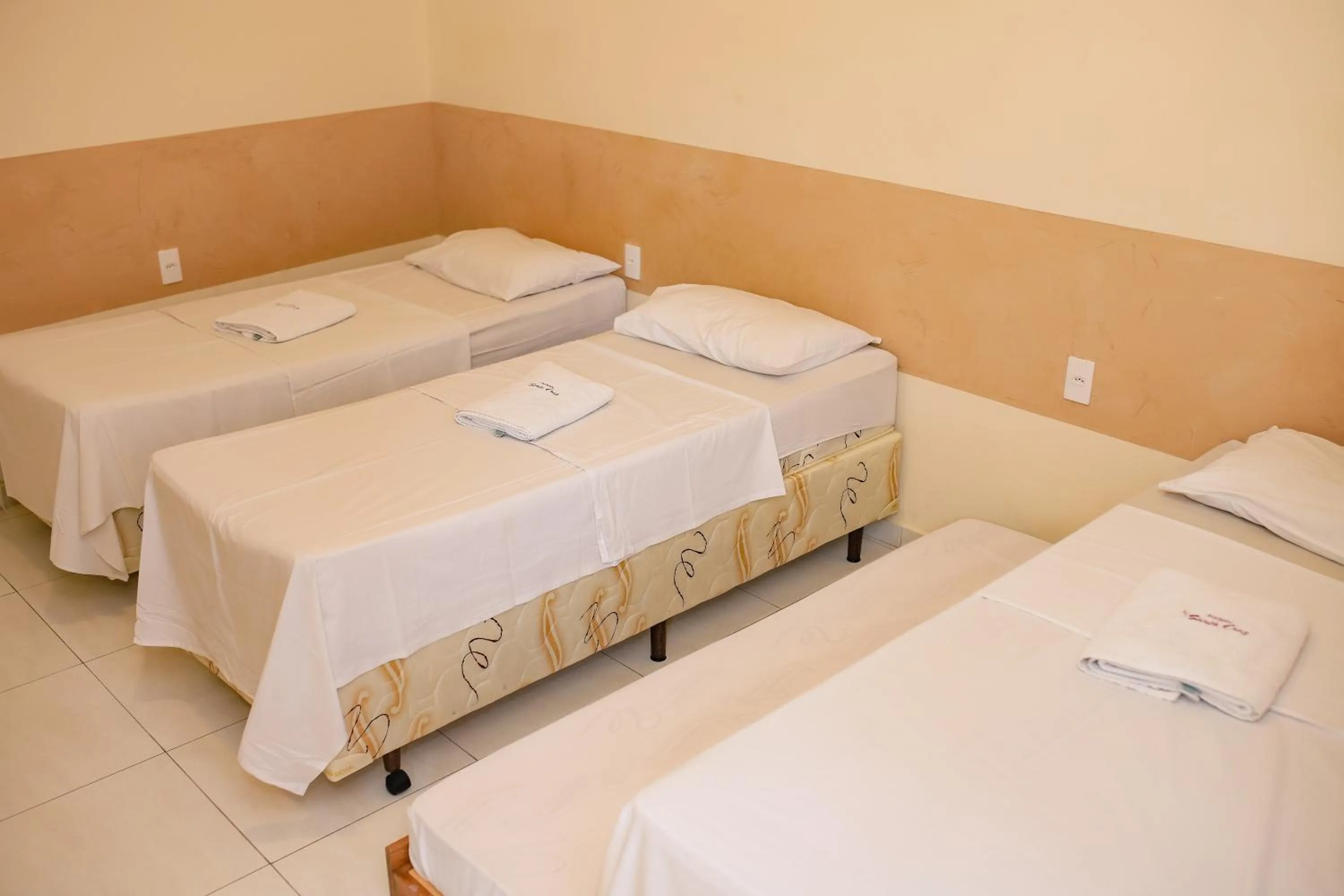 Bed in Pousada Santa Cruz