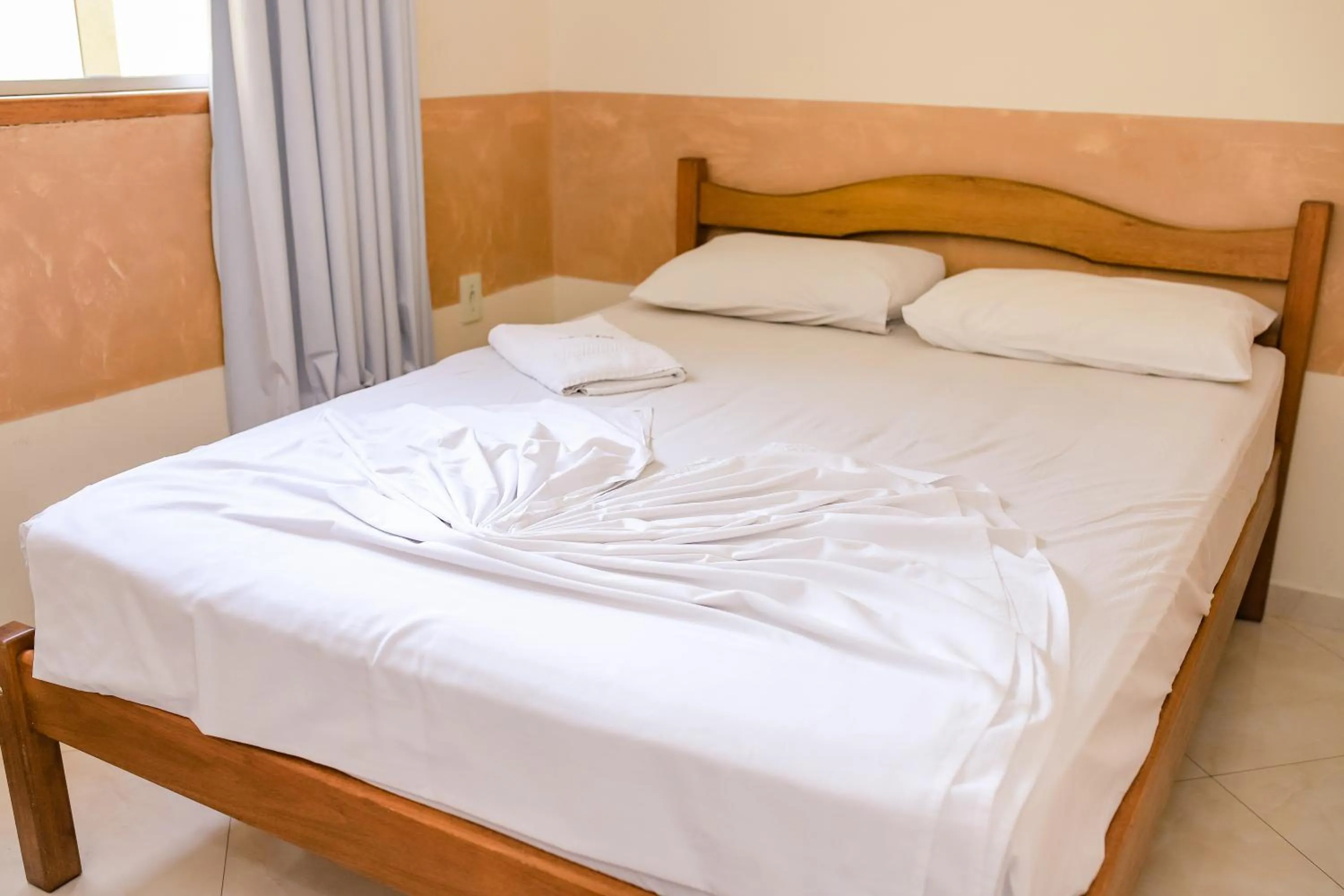 Bed in Pousada Santa Cruz