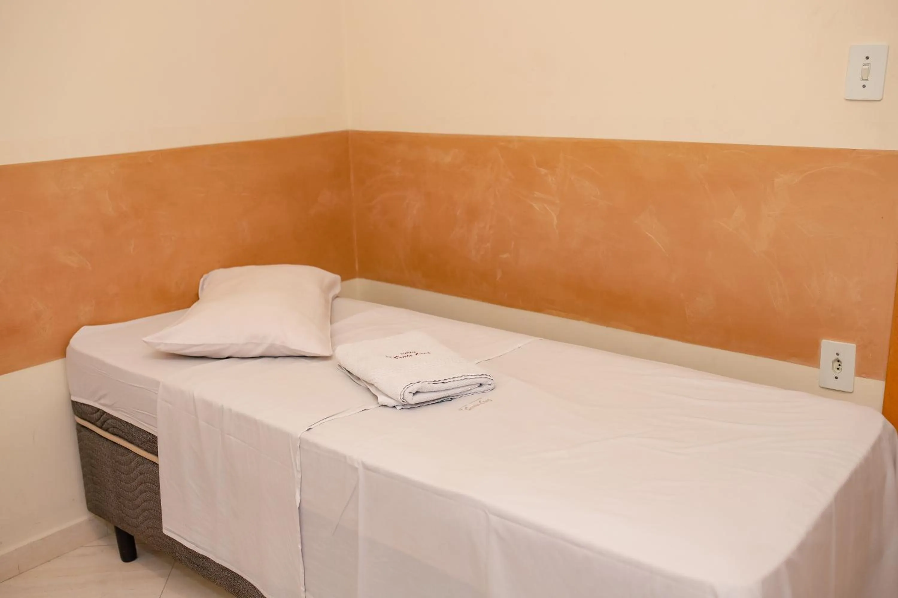 Bed in Pousada Santa Cruz