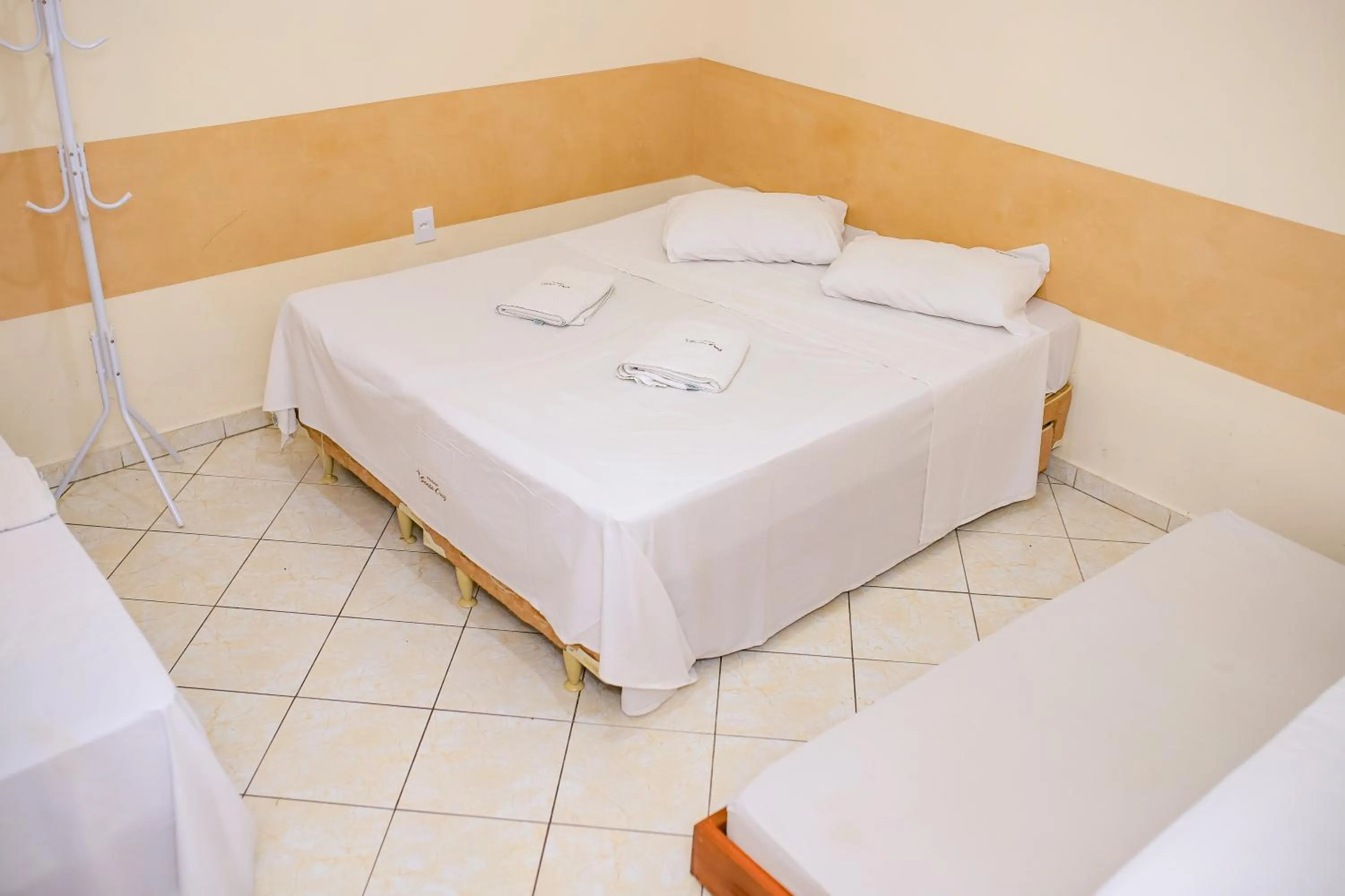 Bed in Pousada Santa Cruz