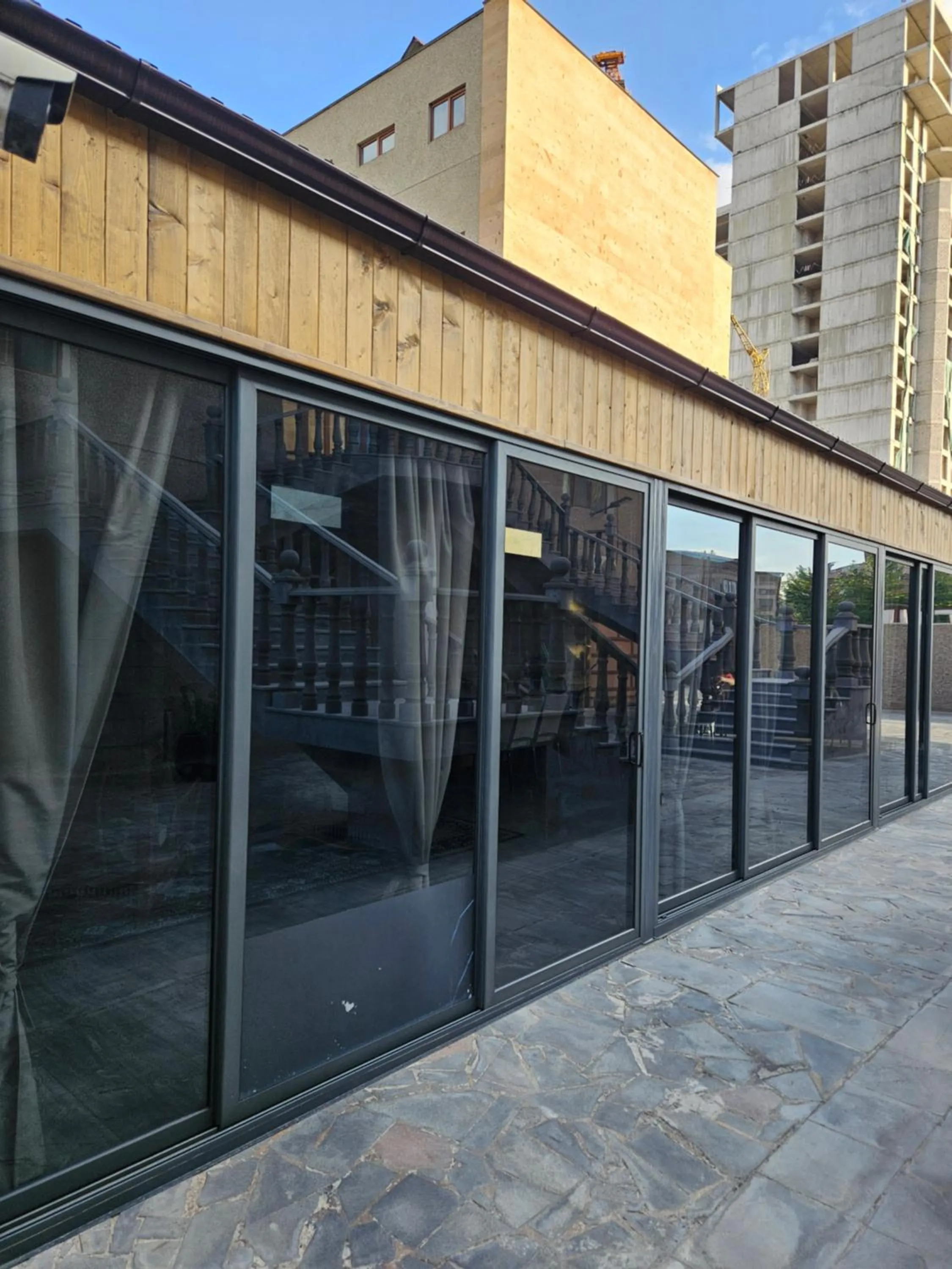 Communal lounge/ TV room in Eridana Hotel