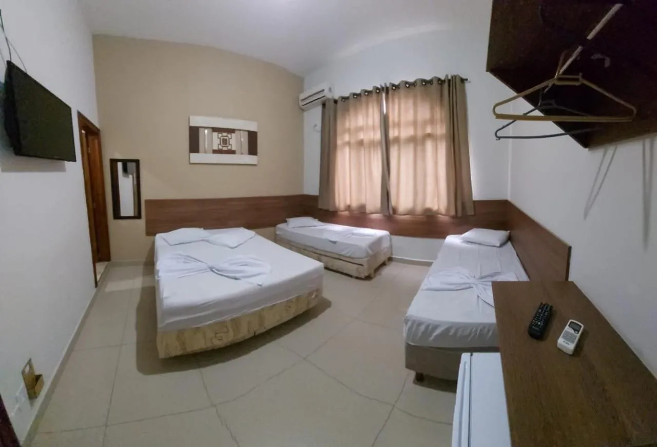 Bed in Pousada Santa Terezinha