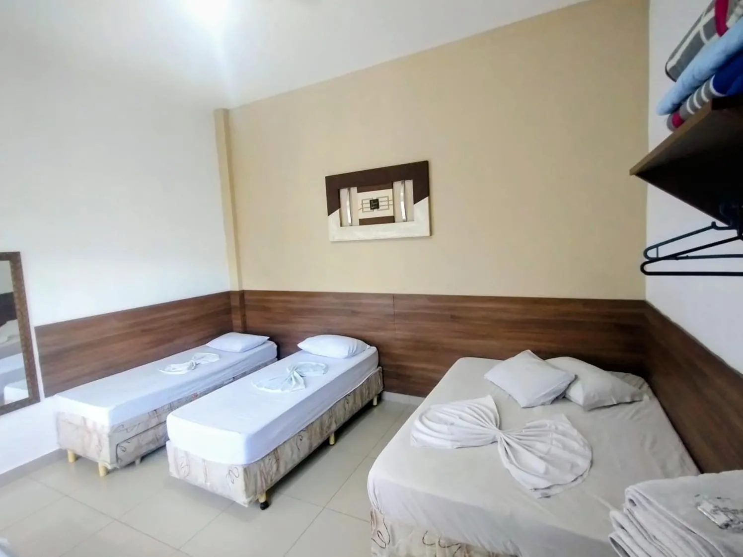 Bed in Pousada Santa Terezinha