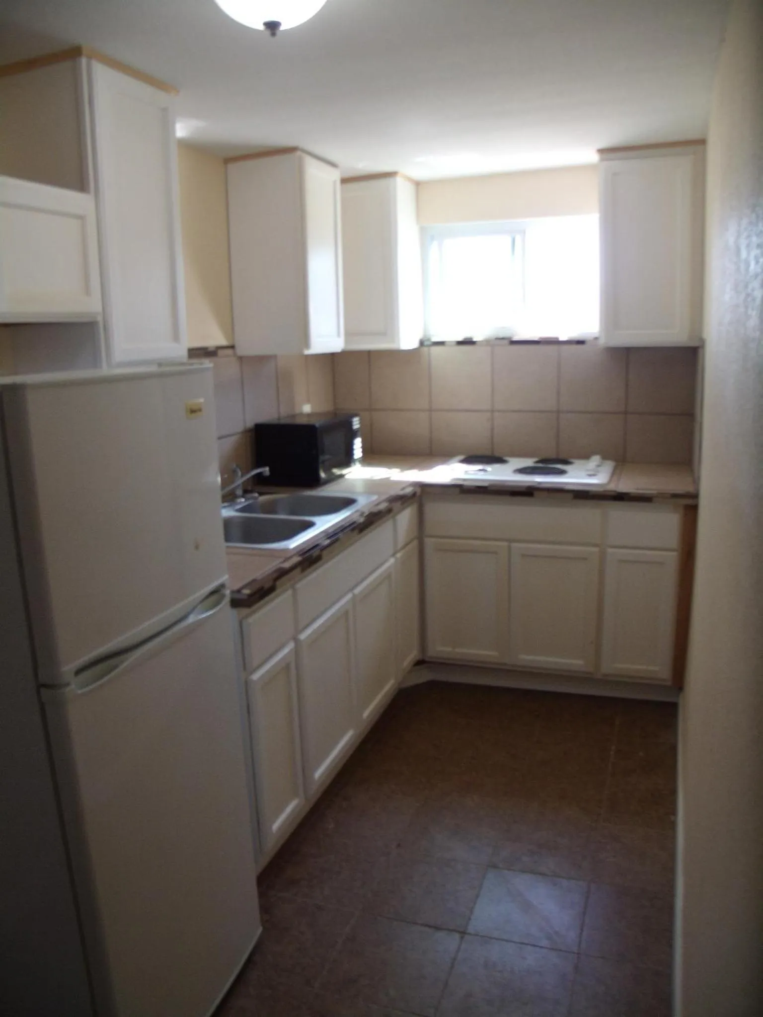 Kitchen or kitchenette in Country Inn Sterling