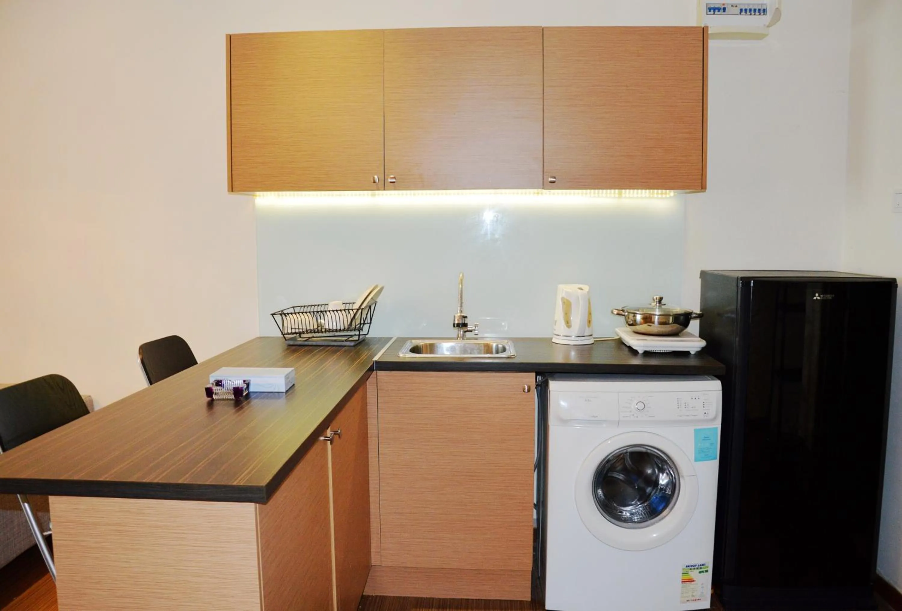 Kitchen or kitchenette in Taragon Residences