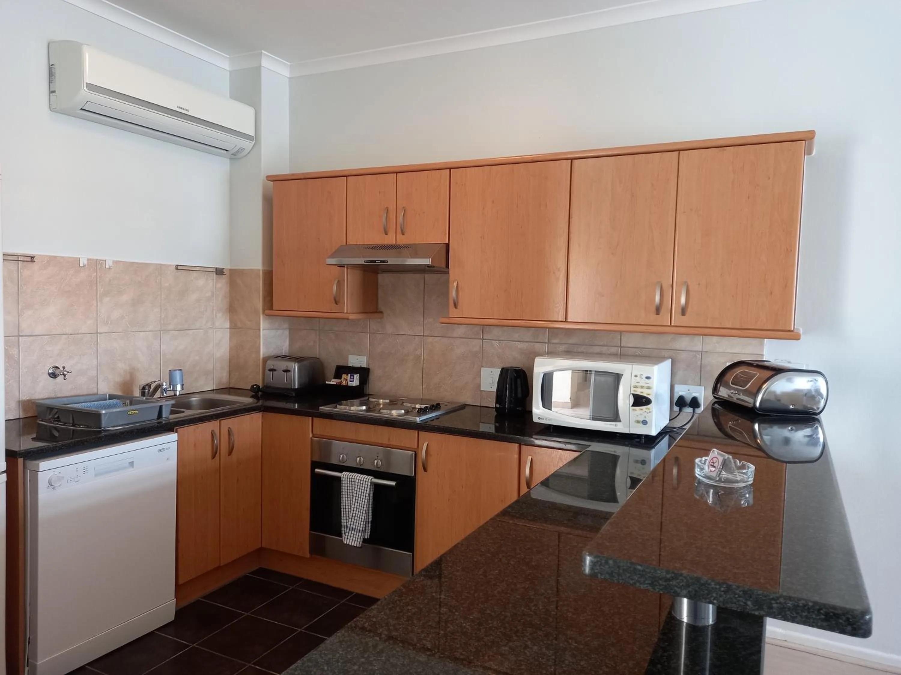 Kitchen or kitchenette in Majorca Apartments by BON Hotels