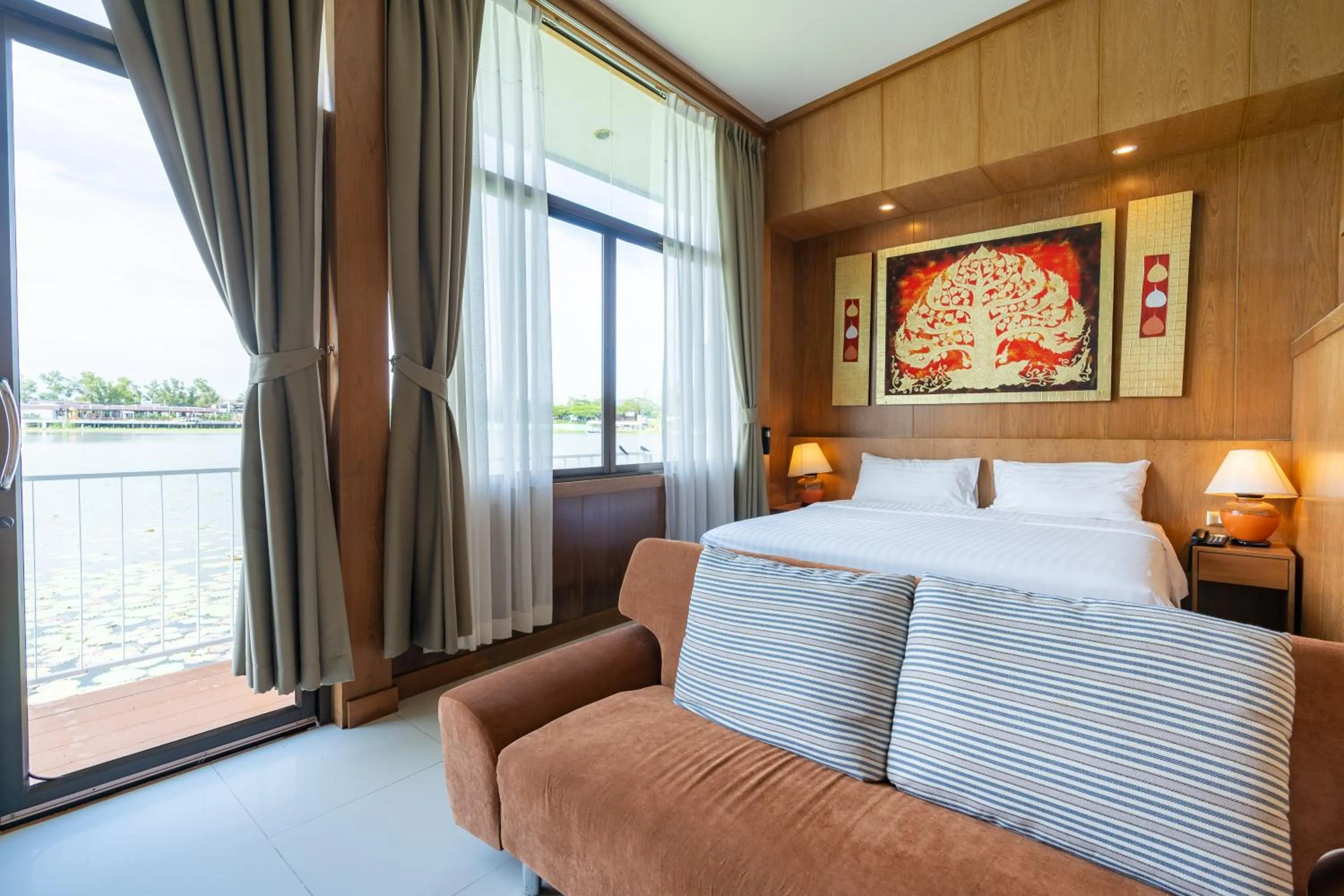 Seating area, Bed in Chabana Resort Bang-tao Beach Phuket- SHA Extra Plus