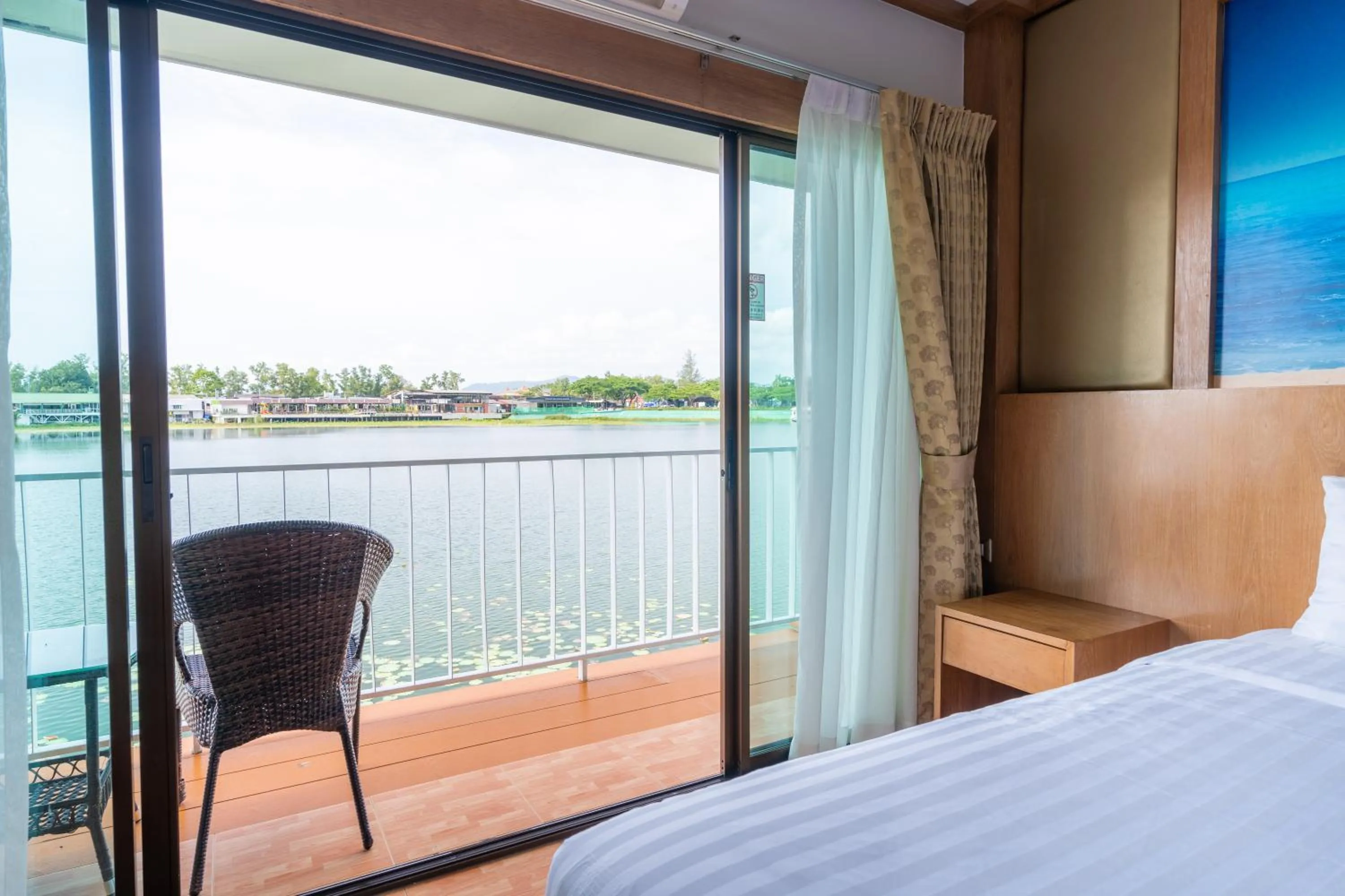 View (from property/room), Bed in Chabana Resort Bang-tao Beach Phuket- SHA Extra Plus