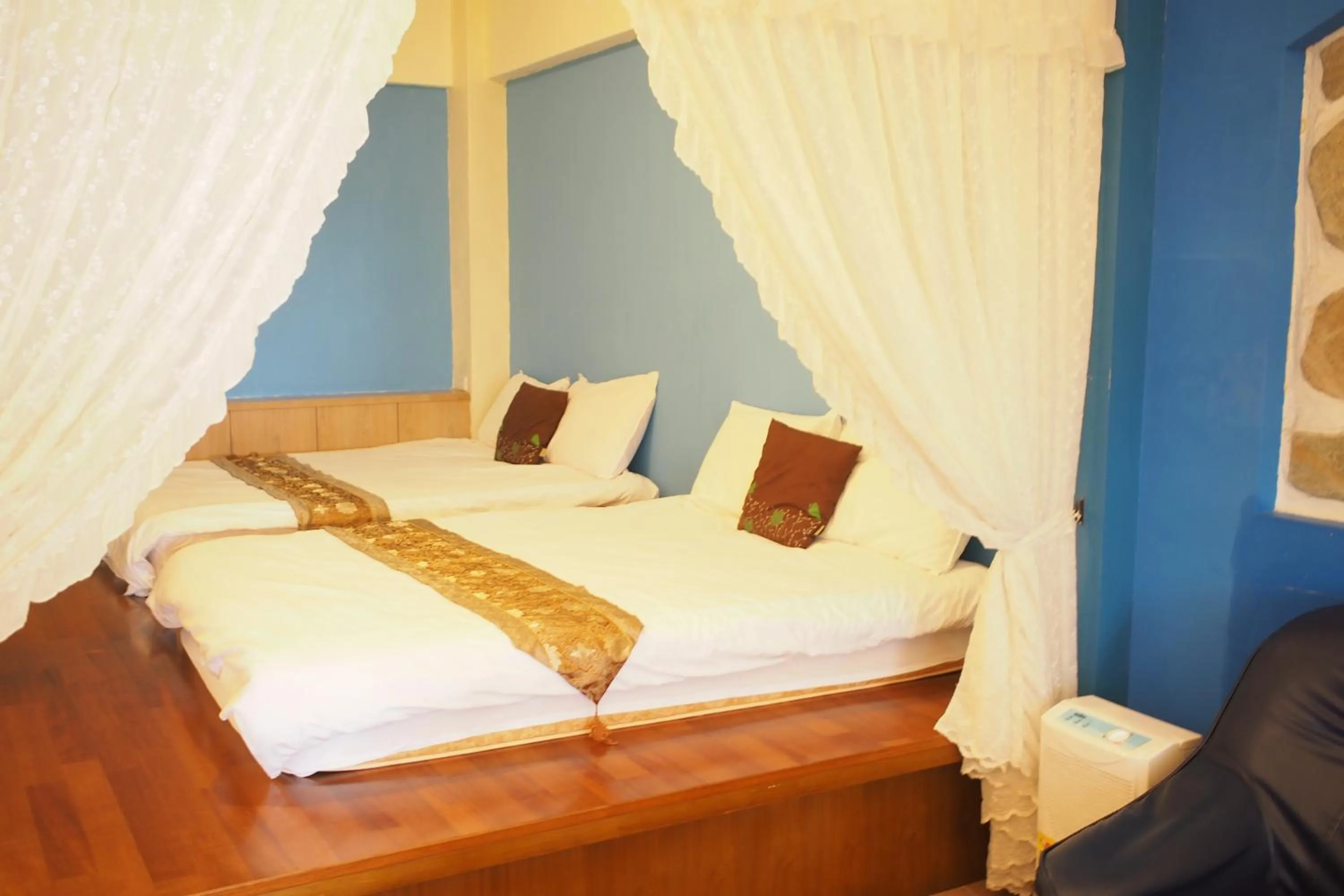 Bed in Shengtuolini B&B