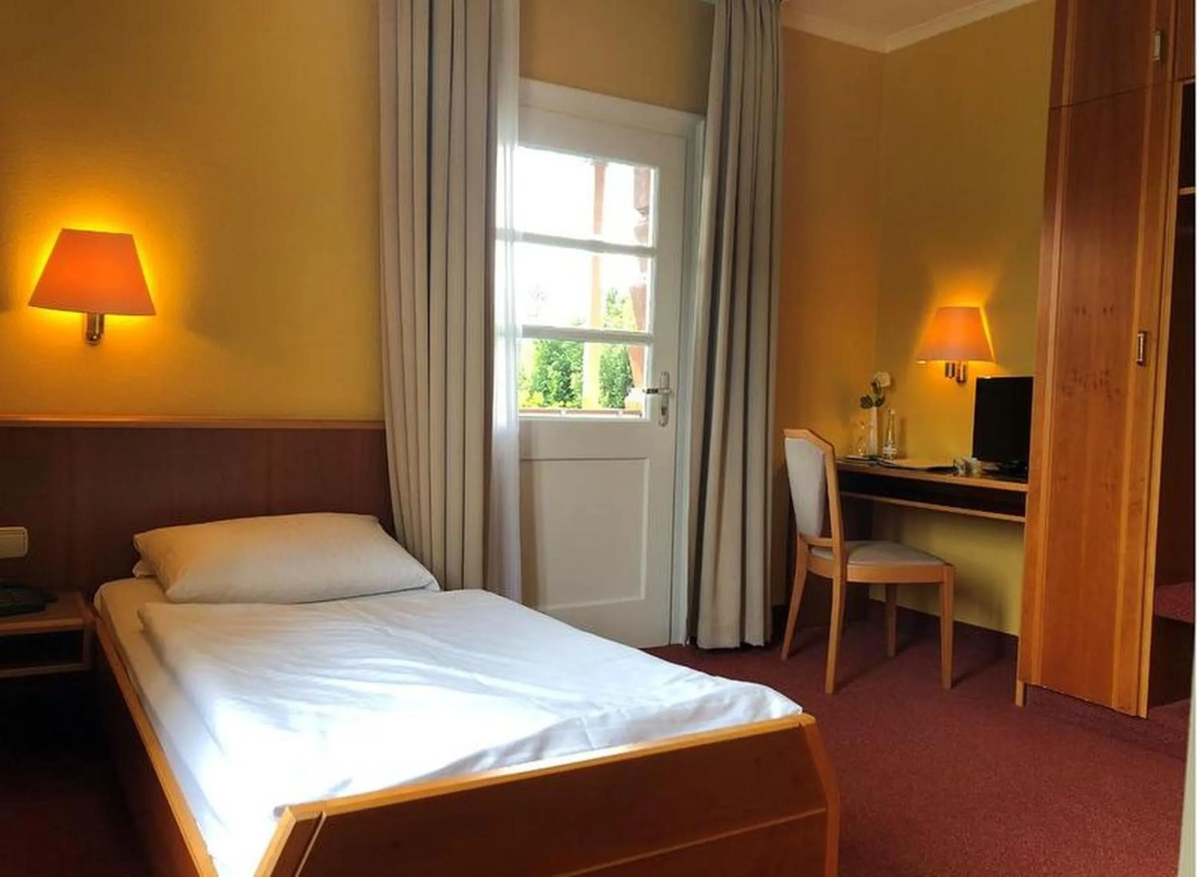 Bedroom in Hotel & Restaurant Weinberg