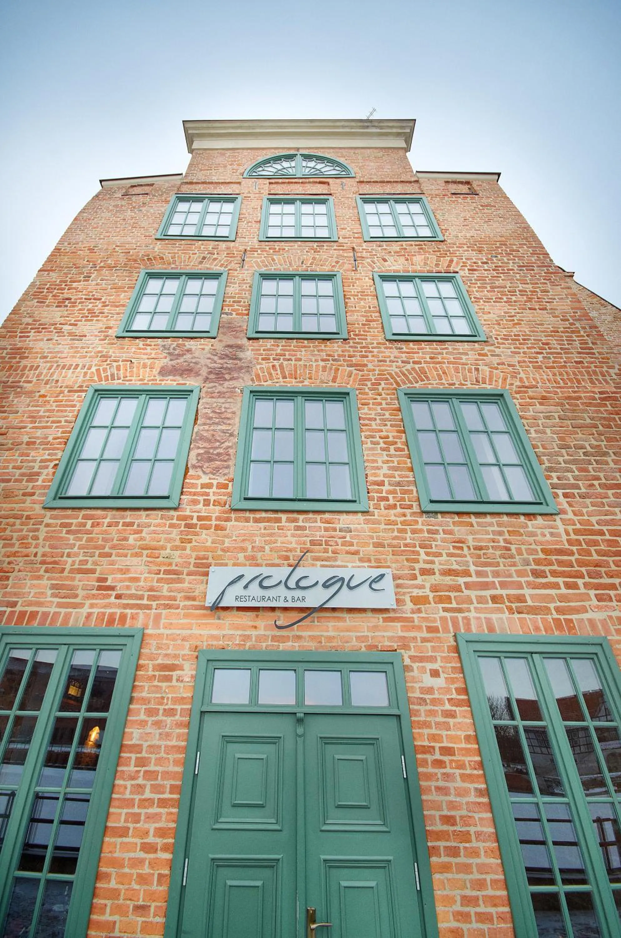 Property building in Komturia Old Town by Fahrenheit