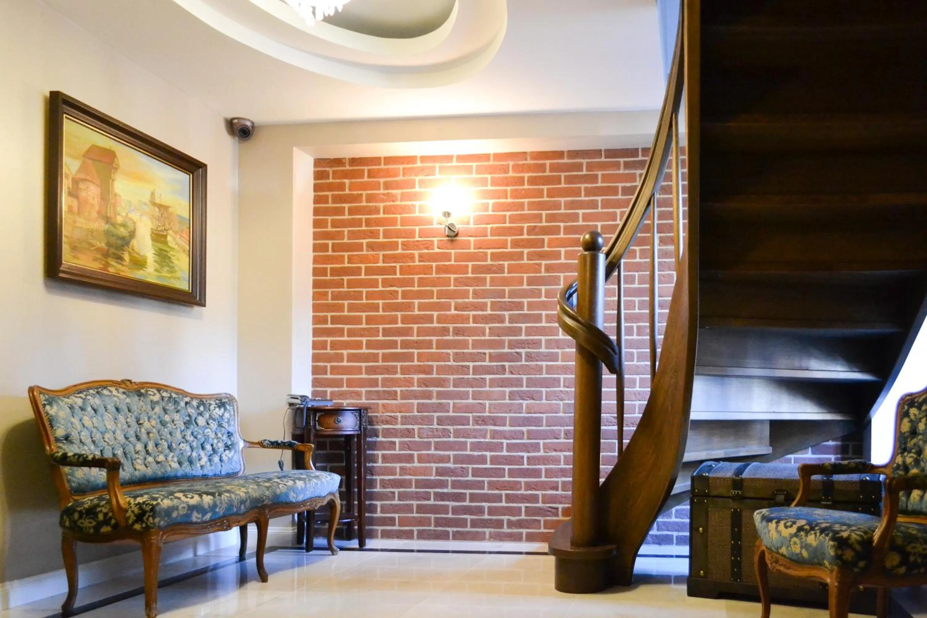 Lobby or reception in Komturia Old Town by Fahrenheit