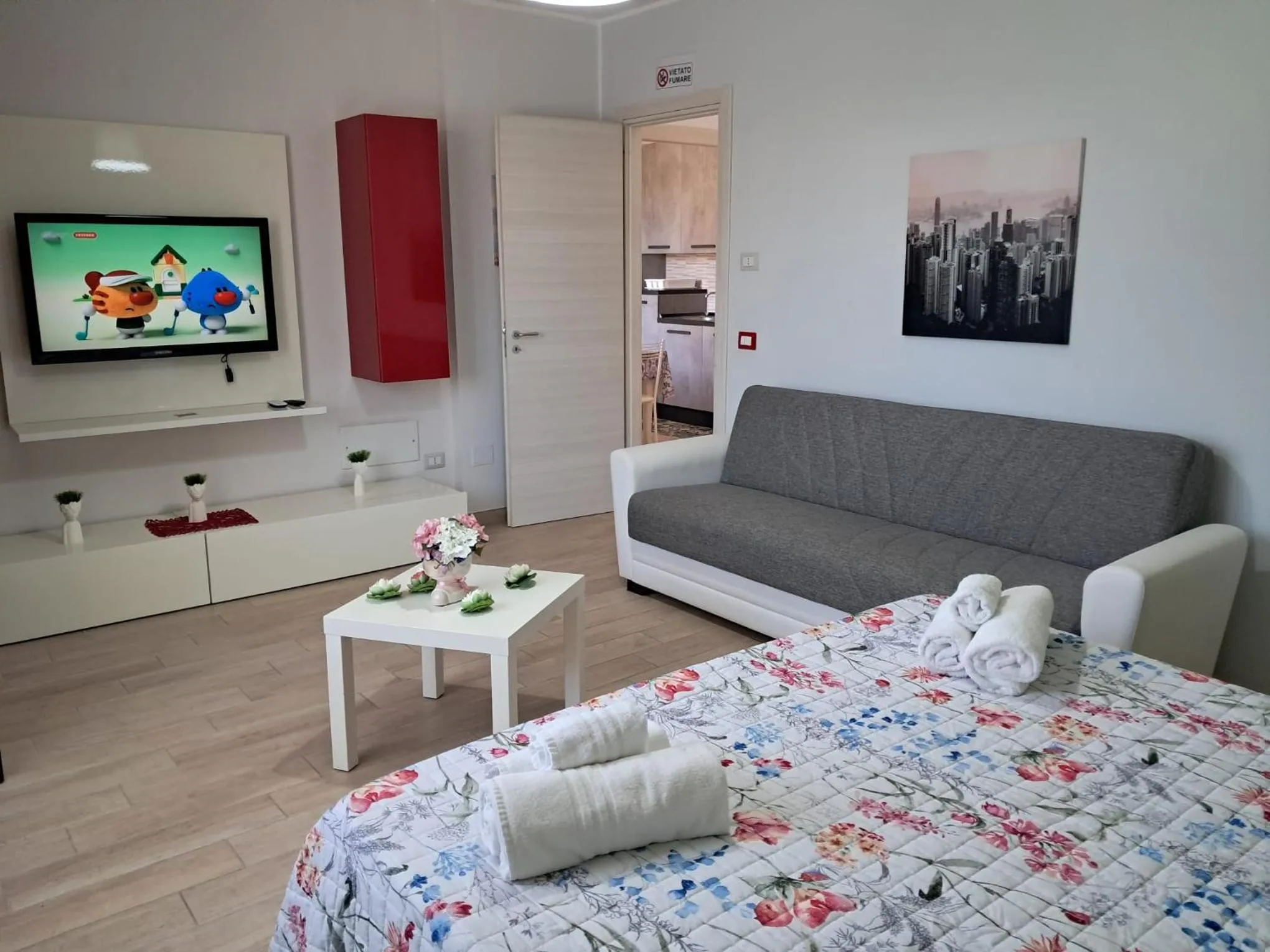 Seating area, Bed in B&B Villa Rosa