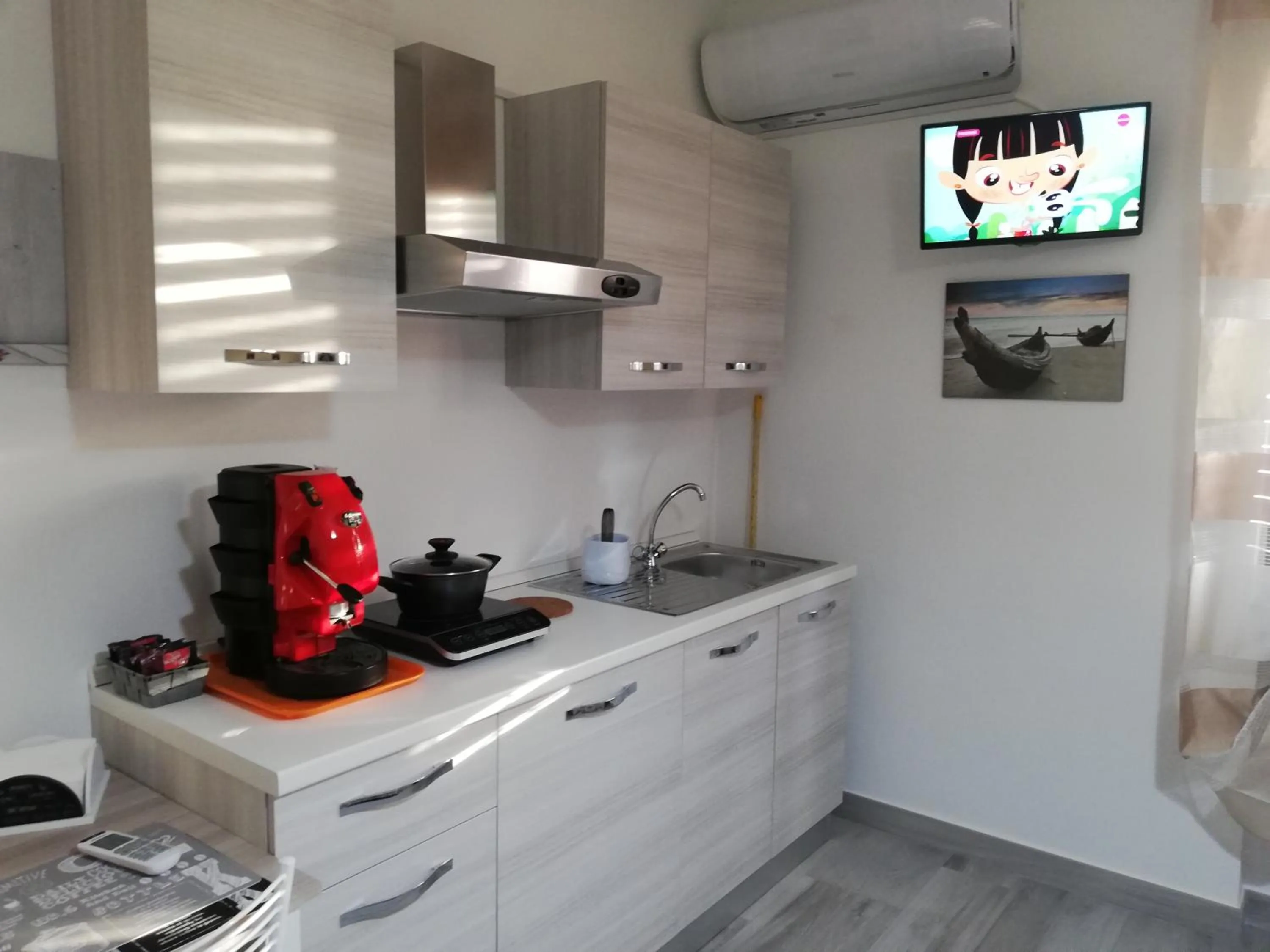 Kitchen or kitchenette in B&B Villa Rosa