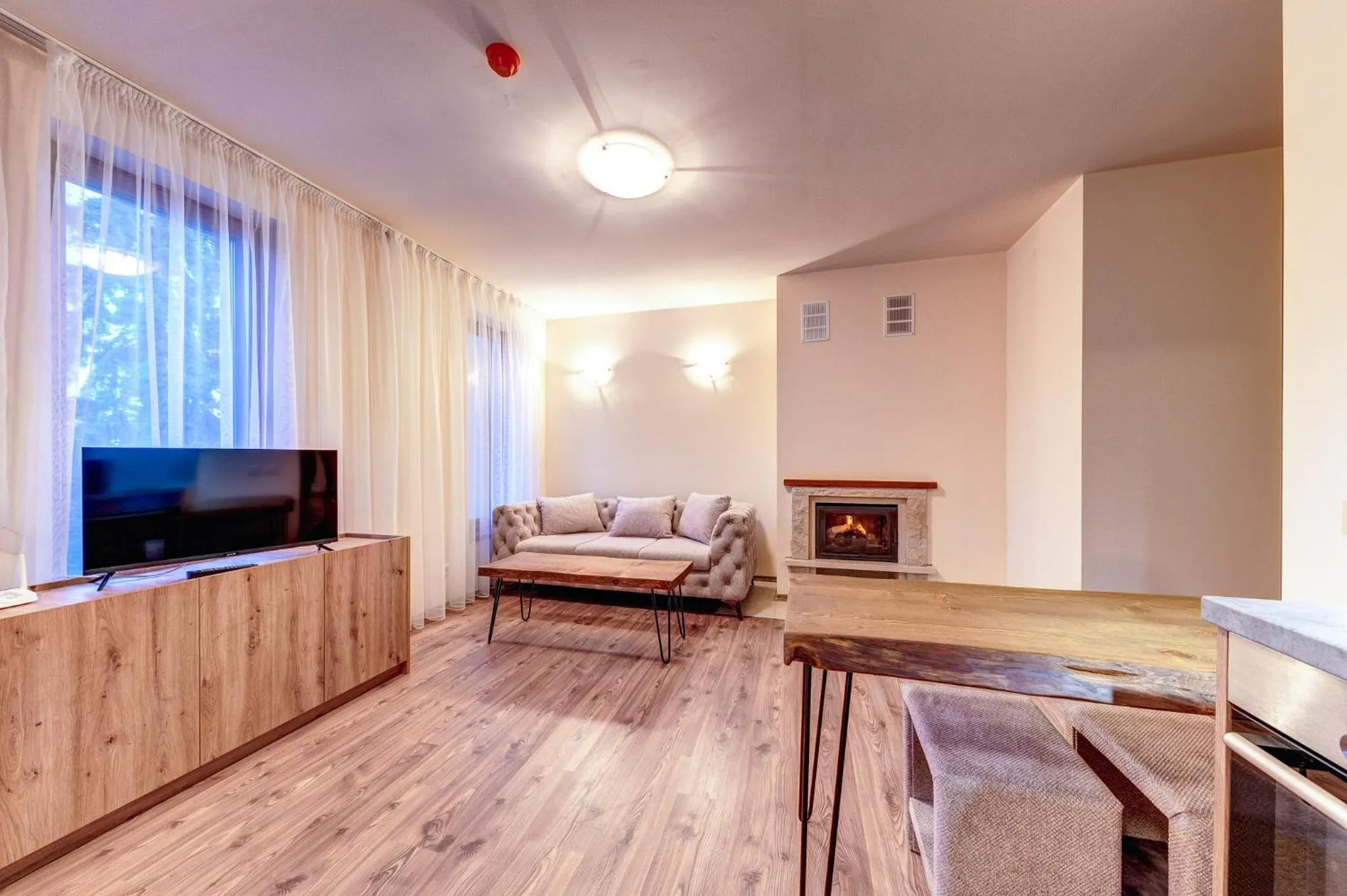 Communal lounge/ TV room in Grand Resort Pamporovo Apartments