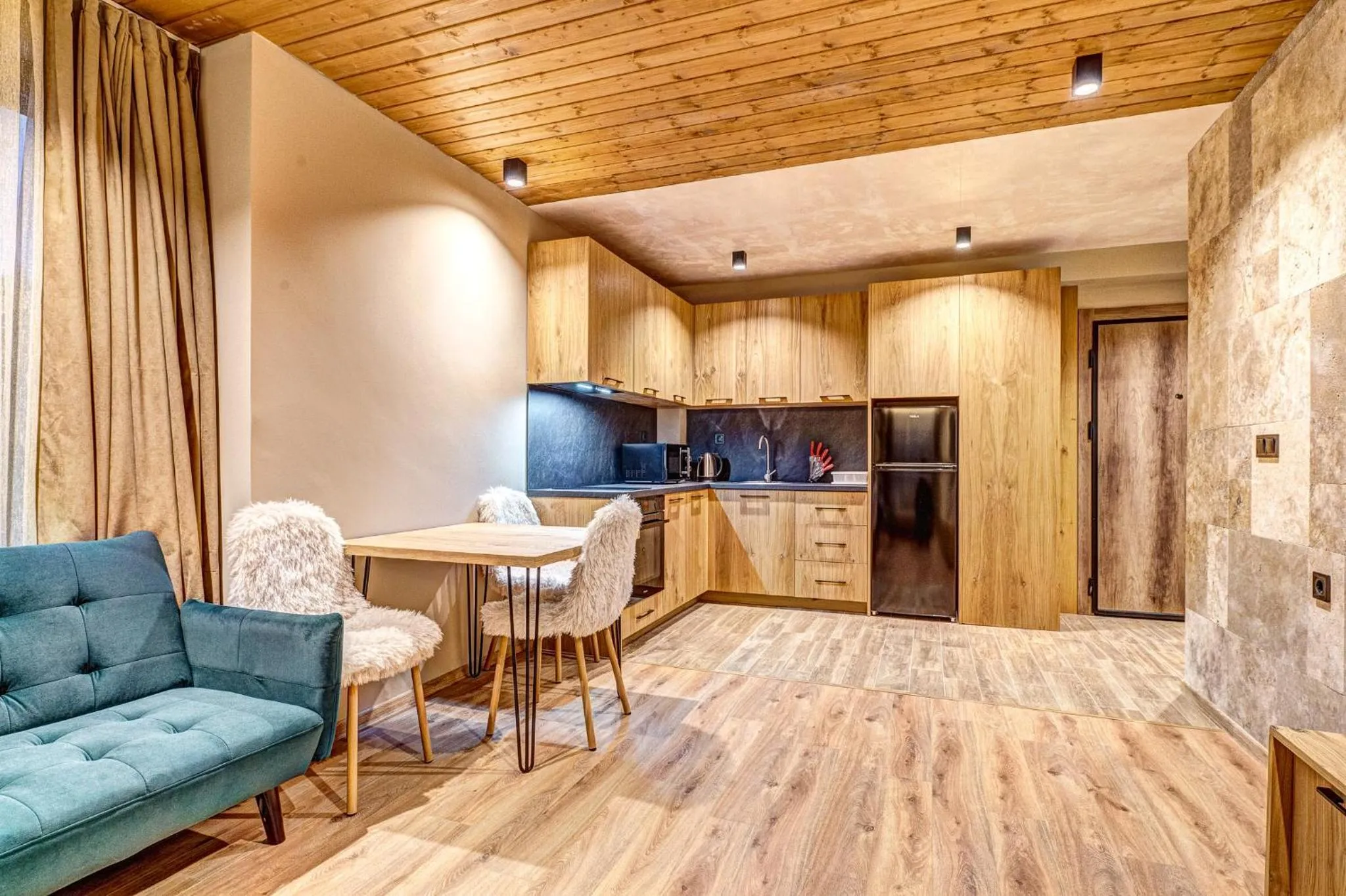 Kitchen or kitchenette in Grand Resort Pamporovo Apartments