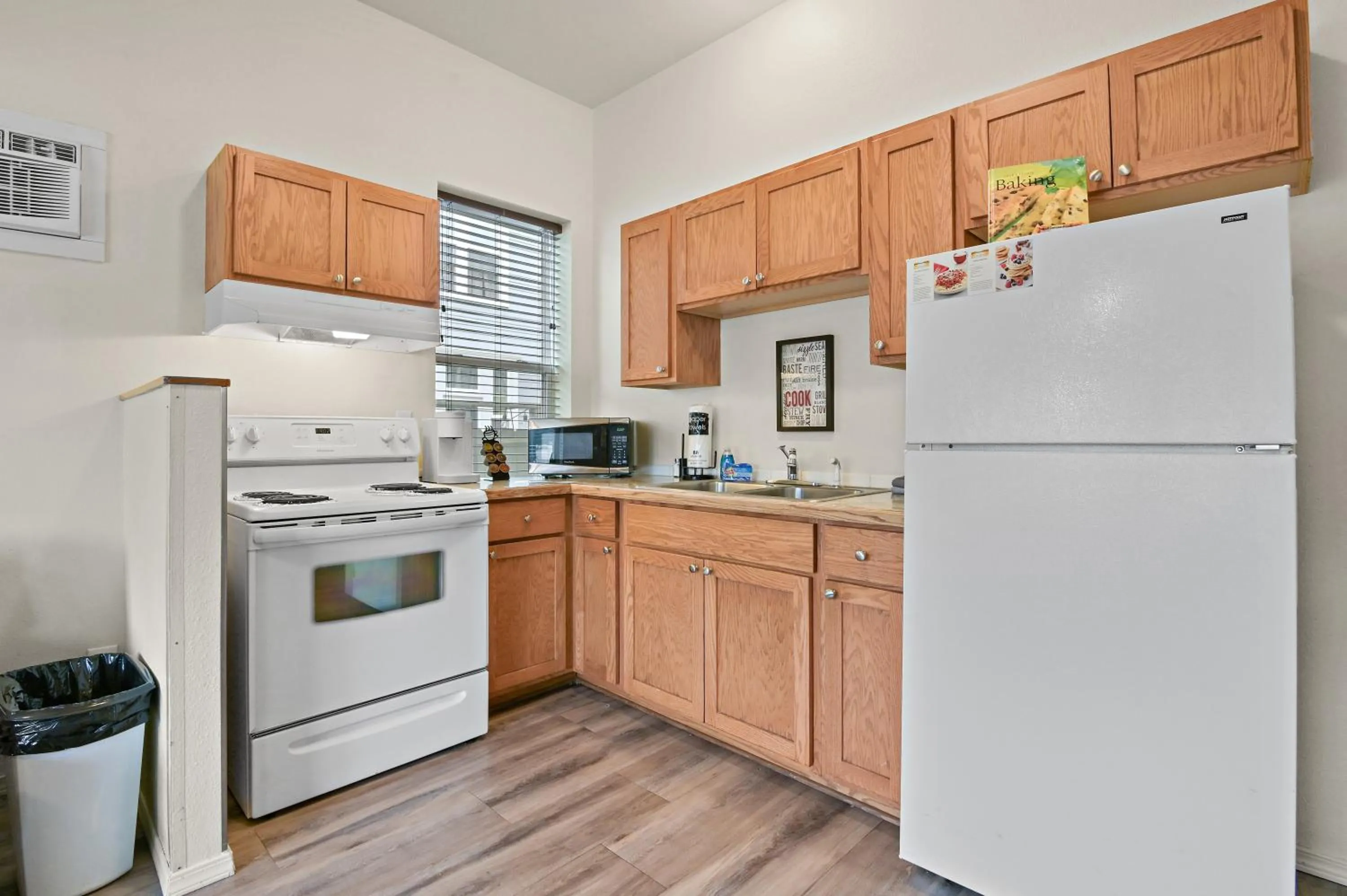 Kitchen or kitchenette in Maple Leaf Manor Suites