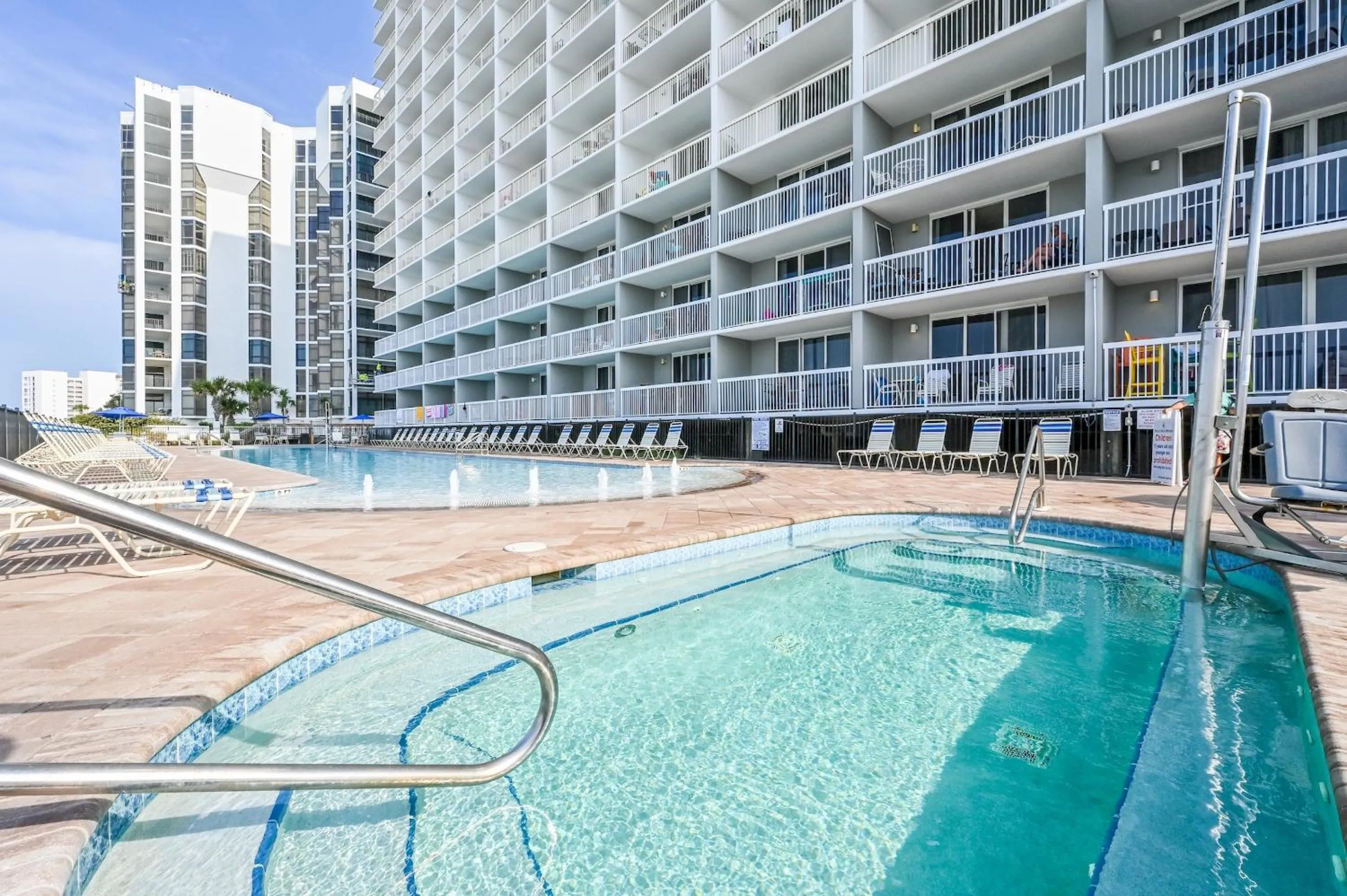 Property building in Pelican Beach Resort by Panhandle Getaways