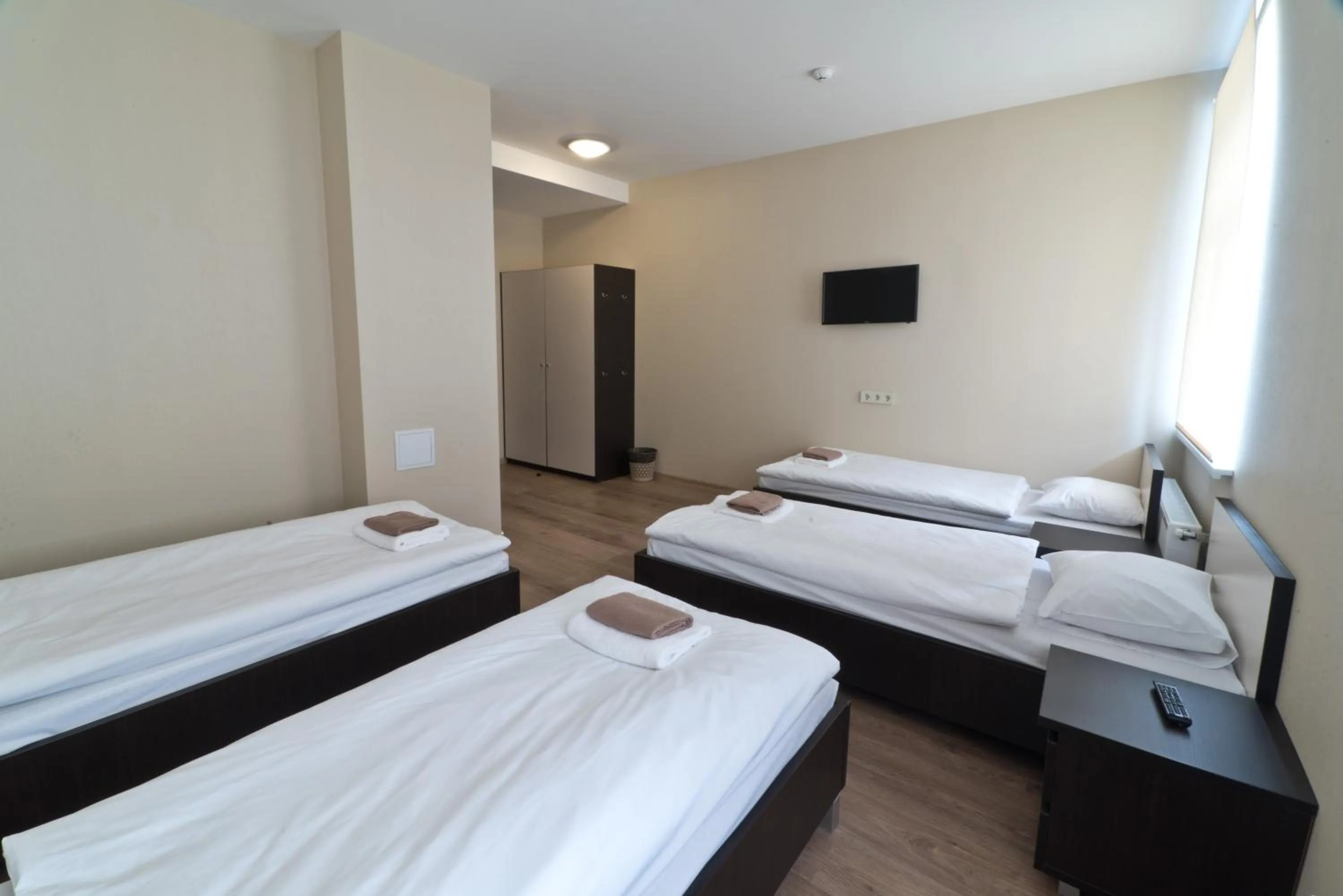 Bed in Bella Riga Hotel with Self-Check in