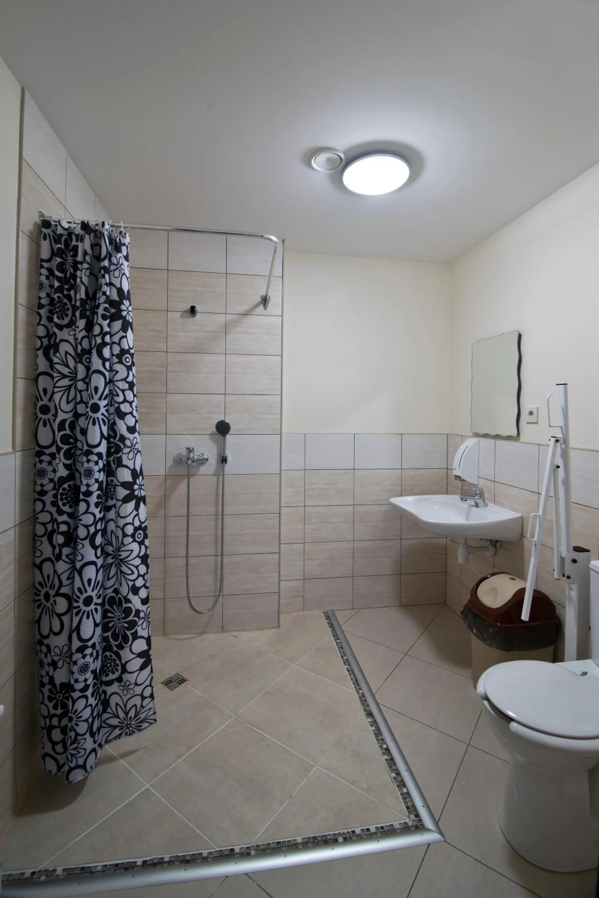 Shower in Bella Riga Hotel with Self-Check in