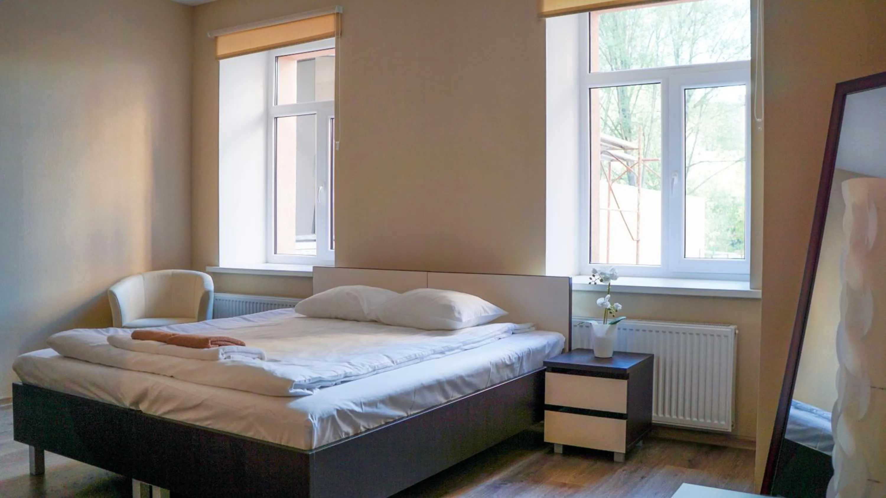 Bed in Bella Riga Hotel with Self-Check in