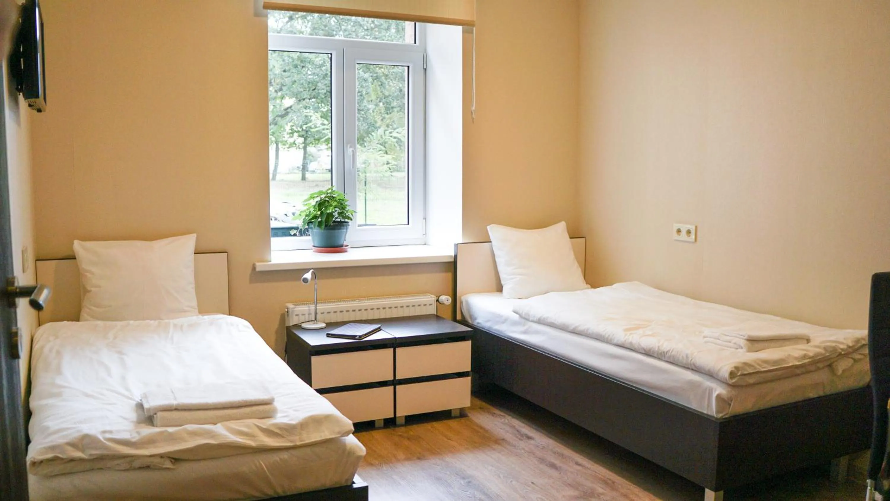 Bed in Bella Riga Hotel with Self-Check in