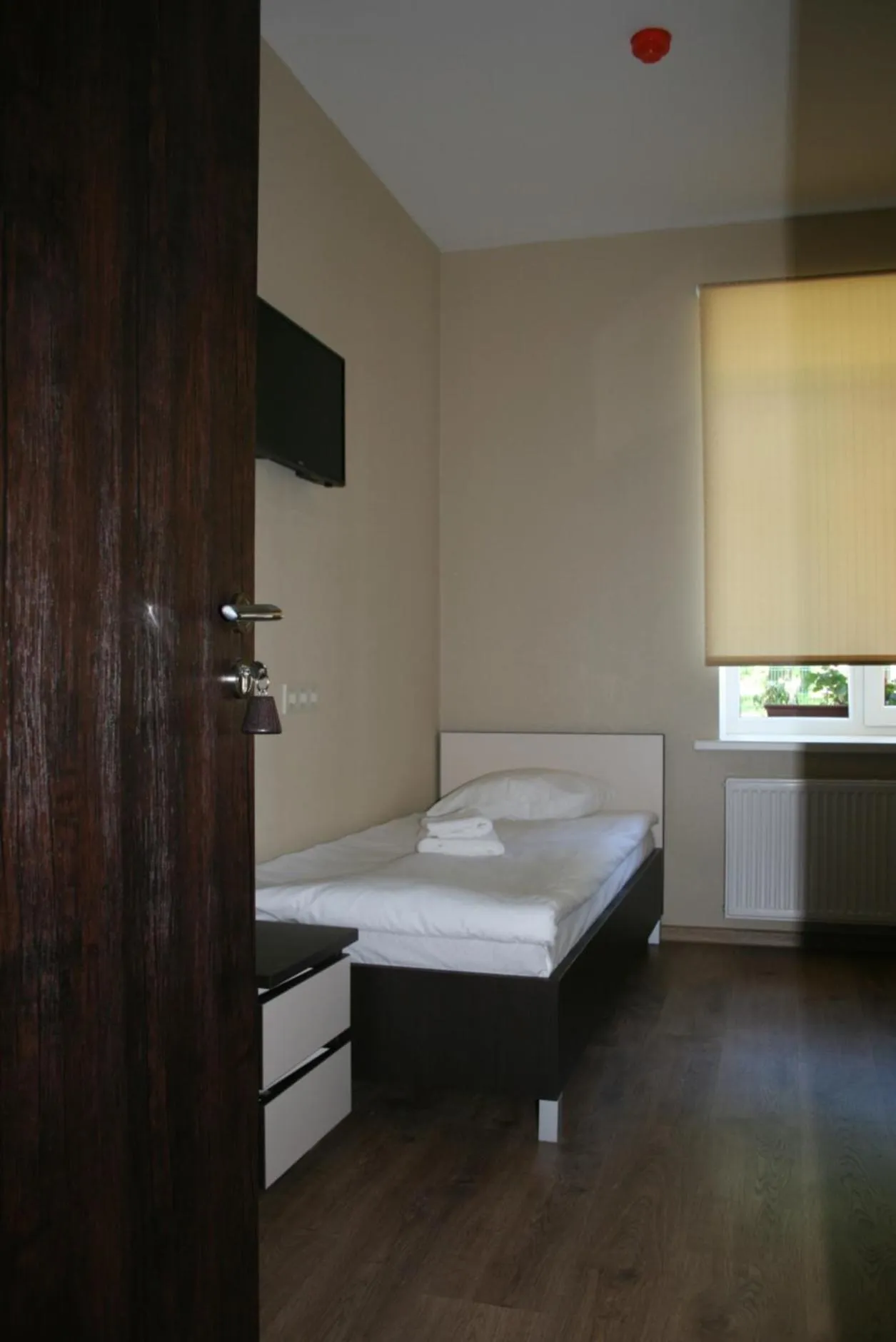 Bed in Bella Riga Hotel with Self-Check in