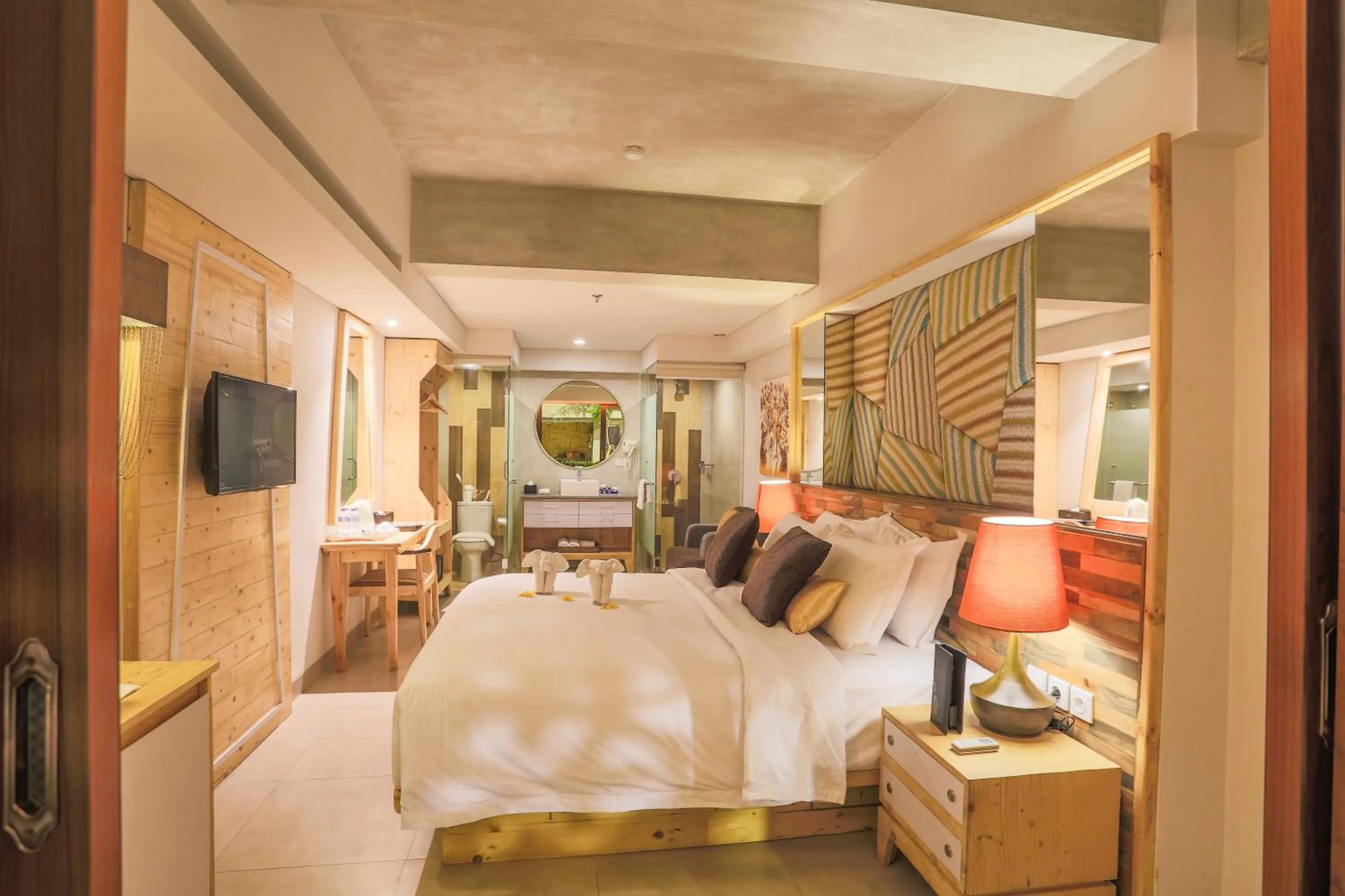 Bed in Serela Legian by KAGUM Hotels